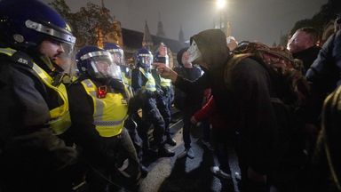 Police and protesters during the Million Mask March 2021 in Parliament Square, London. Picture date: Friday November 5, 2021.